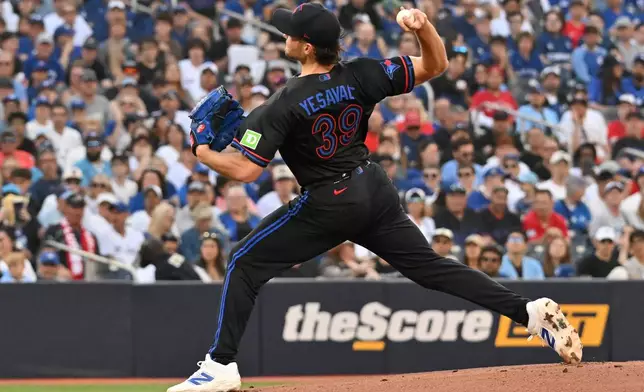 Toronto Blue Jays pitcher Trey Yesavage (39) throws to a New York Yankees batter during first inning of a baseball game in Toronto on Friday, June 12, 2026. (Jon Blacker/The Canadian Press via AP)