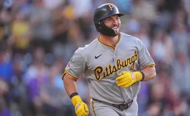 Pittsburgh Pirates' Spencer Horwitz heads up the first base line after hitting a solo home run off Colorado Rockies starting pitcher Tomoyuki Sugano in the first inning of a baseball game Saturday, June 20, 2026, in Denver. (AP Photo/David Zalubowski)