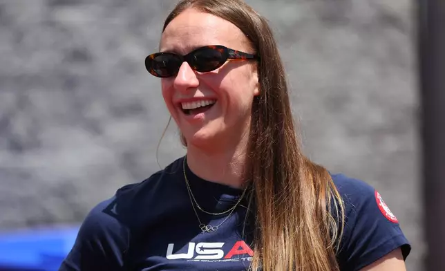 Hayley Scamurra, an Olympic gold medalist women's hockey player, watches Buffalo Bills players during an NFL football practice in Orchard Park, N.Y., Tuesday, June 2, 2026. (AP Photo/Jeffrey T. Barnes)