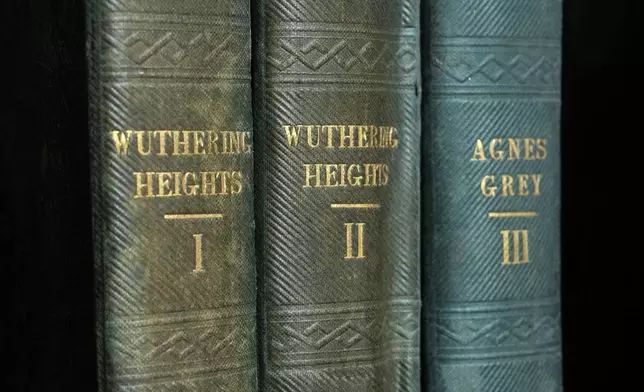 A first edition of Emily Bronte's Wuthering Heights, is on display for sale at Christie's auction house, with copies estimated at 400,000–600,000 GBP (540,000–810,000 USD) in London, Monday, June 15, 2026. (AP Photo/Kin Cheung)
