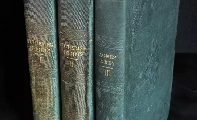 A first edition of Emily Bronte's Wuthering Heights, is on display for sale at Christie's auction house, with copies estimated at 400,000–600,000 GBP (540,000–810,000 USD) in London, Monday, June 15, 2026. (AP Photo/Kin Cheung)