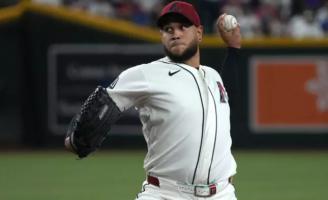 Arizona Diamondbacks pitcher Eduardo Rodriguez throws against the Los Angeles Dodgers in the first inning of a baseball game, Monday, June 1, 2026, in Phoenix. (AP Photo/Rick Scuteri)