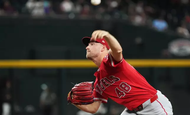 Los Angeles Angels pitcher Reid Detmers throws against the Arizona Diamondbacks in the first inning of a baseball game, Tuesday, June 16, 2026, in Phoenix. (AP Photo/Rick Scuteri)