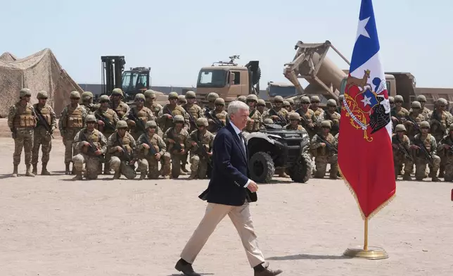 FILE - Chilean President Jose Antonio Kast arrives for a press conference at the military base "Solo de Zaldivar," near the Chacalluta border crossing, in Arica, Chile, March 16, 2026, after signing a decree to deter irregular migration along the northern border with Peru and Bolivia. (AP Photo/Esteban Felix, File)