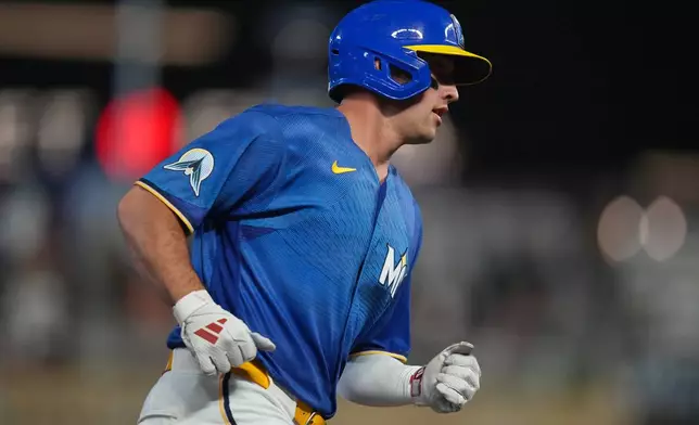 Minnesota Twins' Brooks Lee runs the bases after hitting a solo home run during the sixth inning of a baseball game against the Kansas City Royals, Friday, June 5, 2026, in Minneapolis. (AP Photo/Abbie Parr)