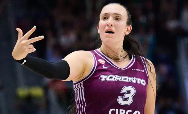 Toronto Tempo's Marina Mabrey celebrates after scoring against the Los Angeles Sparks during the first half of a WNBA basketball game in Toronto, Thursday, June 25, 2026. (Sammy Kogan/The Canadian Press via AP)