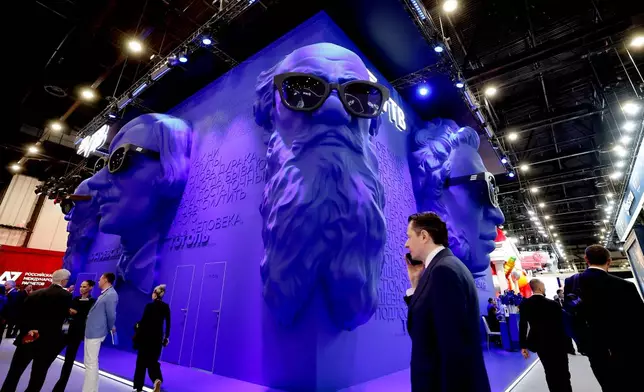 People visit an exhibition at the St. Petersburg International Economic Forum in St.Petersburg, Russia, on Thursday, June 4, 2026. (Anatoly Maltsev/Pool Photo via AP)