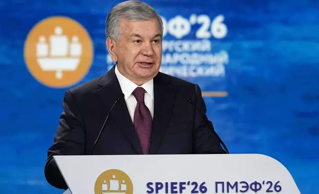 Uzbekistan's President Shavkat Mirziyoyev addresses a plenary session at the St. Petersburg International Economic Forum in St. Petersburg, Russia, on Friday, June 5, 2026. (AP Photo/Dmitri Lovetsky)