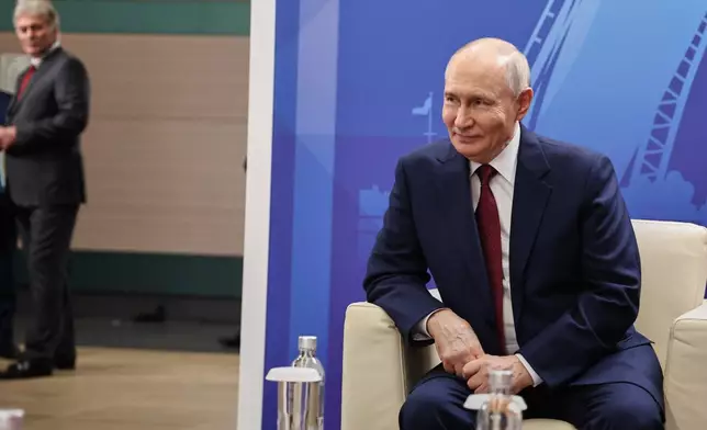 Russian President Vladimir Putin sits prior to a plenary session at the St. Petersburg International Economic Forum in St. Petersburg, Russia, on Friday, June 5, 2026. (AP Photo/Dmitri Lovetsky)