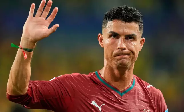 Portugal's Cristiano Ronaldo (7) waves following the World Cup Group K soccer match between Colombia and Portugal in Miami Gardens, Fla., Saturday, June 27, 2026. (AP Photo/Rebecca Blackwell)