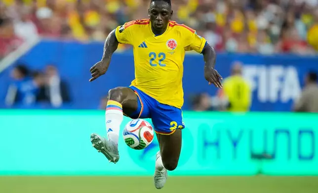 Colombia's Deiver Machado (22) attempts to control the ball during the World Cup Group K soccer match between Colombia and Portugal in Miami Gardens, Fla., Saturday, June 27, 2026. (AP Photo/Rebecca Blackwell)