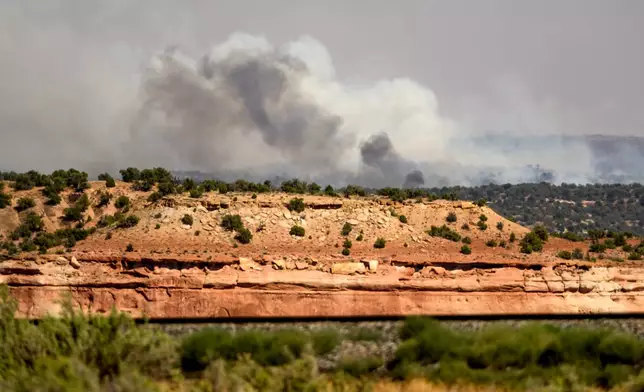 The Snyder Fire burns near Thompson Springs, Utah, on Sunday, June 28, 2026. (AP Photo/Noah Berger)