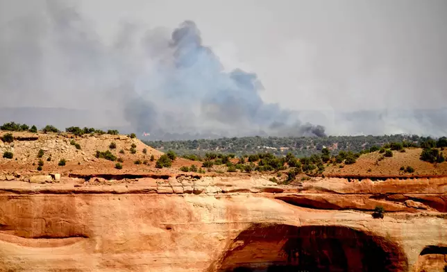 The Snyder Fire burns near Thompson Springs, Utah, on Sunday, June 28, 2026. (AP Photo/Noah Berger)