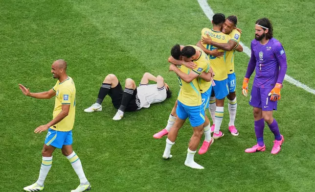 Brazil players celebrate at the end of the World Cup round of 32 soccer match between Brazil and Japan in Houston, Monday, June 29, 2026. (AP Photo/Eric Smith)