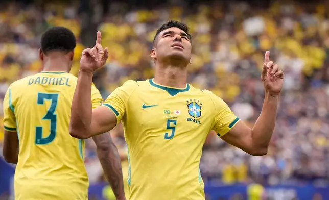 Brazil's Casemiro (5) celebrates after scoring his side's first goal during the World Cup round of 32 soccer match between Brazil and Japan in Houston, Monday, June 29, 2026. (AP Photo/Ashley Landis)