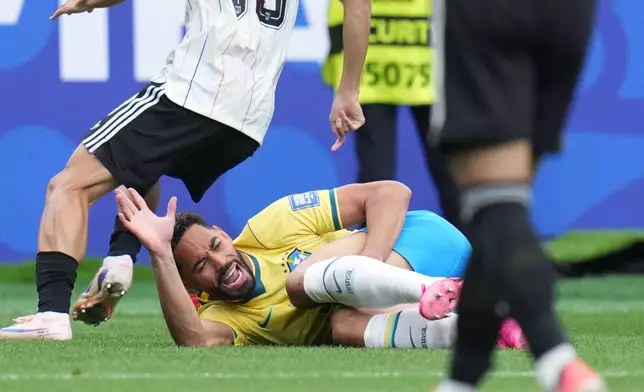 Brazil's Matheus Cunha (9) reacts during the World Cup round of 32 soccer match between Brazil and Japan in Houston, Monday, June 29, 2026. (AP Photo/Karen Warren)