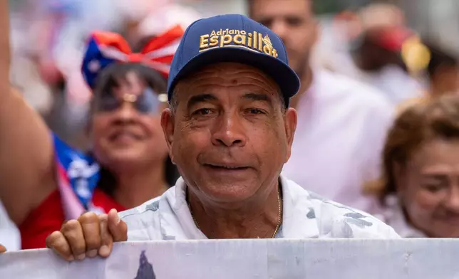 Rep. Adriano Espaillat, D-N.Y., takes part in the National Puerto Rican Day Parade, Sunday, June 14, 2026 in New York. (AP Photo/Adam Gray)