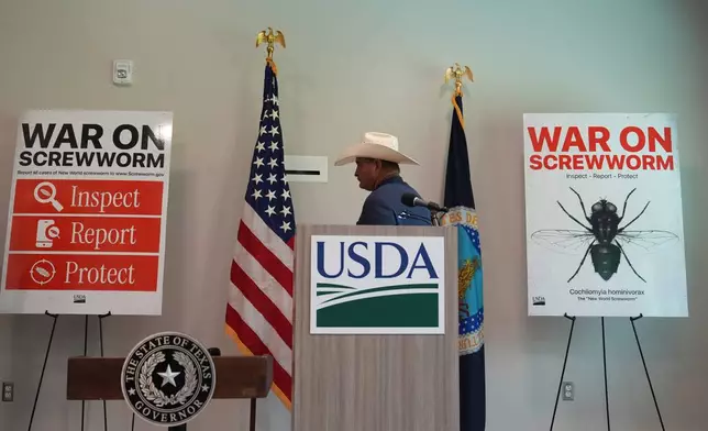 A ranchers arrivse for a news conference with U.S. Agriculture Secretary Brooke Rollins at the Knipling-Bushland U.S. Livestock Insects Research Laboratory in Kerrville, Texas, Monday, June 8, 2026. (AP Photo/Eric Gay)