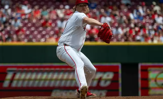 Cincinnati Reds pitcher Andrew Abbott delivers in the third inning of a baseball game against the Arizona Diamondbacks, Sunday, June 14, 2026, in Cincinnati. (AP Photo/Michael Swensen)