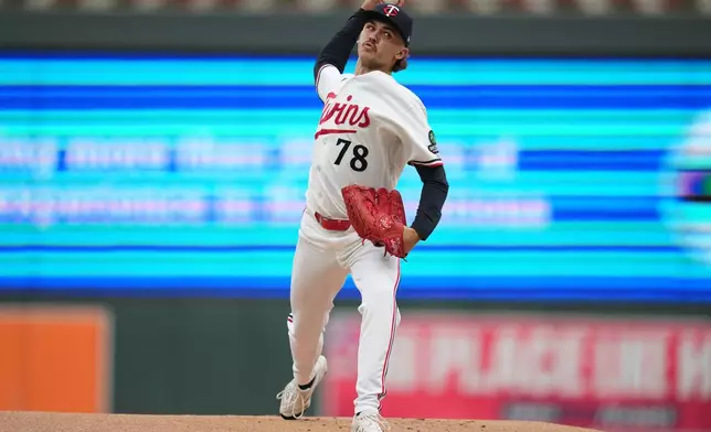 Minnesota Twins starting pitcher Andrew Morris delivers during the first inning of a baseball game against the Kansas City Royals, Thursday, June 4, 2026, in Minneapolis. (AP Photo/Abbie Parr)