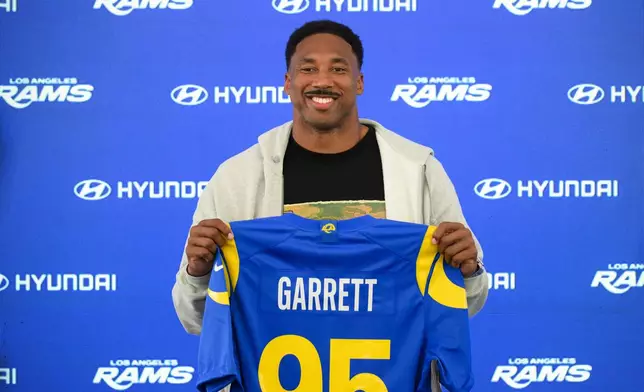 Los Angeles Rams defensive end Myles Garrett pose for a photo during a press conference following the NFL football team's practice, Tuesday, June 2, 2026, in Woodland Hills, Calif. (AP Photo/Kyusung Gong)