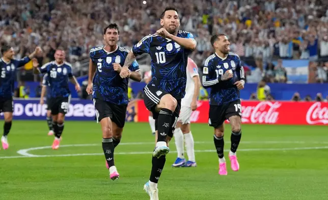 Argentina's Lionel Messi (10) celebrates scoring his side's 3rd goal during the World Cup Group J soccer match between Jordan and Argentina in Arlington, Texas, near Dallas, Saturday, June 27, 2026. (AP Photo/Tony Gutierrez)