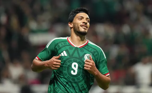 Mexico's Raúl Jiménez celebrates after Serbia's Stefan Bukinac scored an own goal during an international friendly soccer match in Toluca, Mexico, Thursday, June 4, 2026. (AP Photo/Fernando Llano)