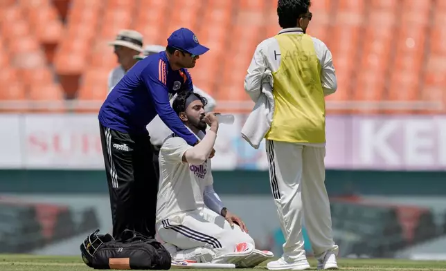 India's KL Rahul has a drink during a break in play on day one of the cricket test match between Afghanistan and India in New Chandigarh, India, Saturday, June 6, 2026. (AP Photo/Ashwini Bhatia)