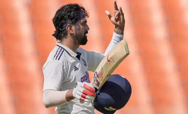 India's KL Rahul celebrates his century on day one of the cricket test match between Afghanistan and India in New Chandigarh, India, Saturday, June 6, 2026. (AP Photo/Ashwini Bhatia)