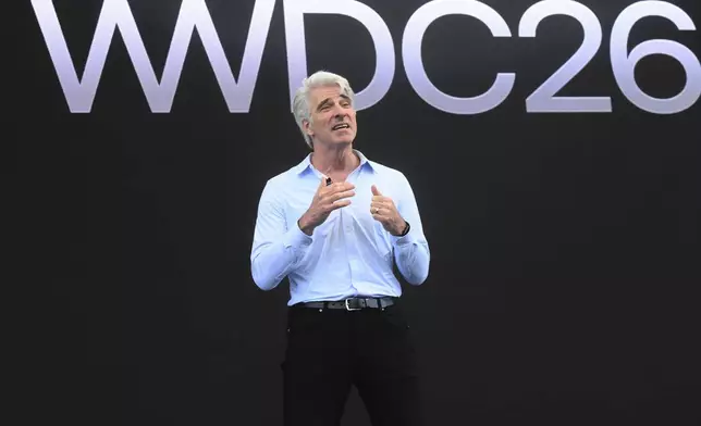 Craig Federighi, Apple's senior vice president of software engineering, speaks during the annual World Wide Developers Conference at Apple's headquarters in Cupertino, Calif., Monday, June 8, 2026. (AP Photo/Noah Berger)