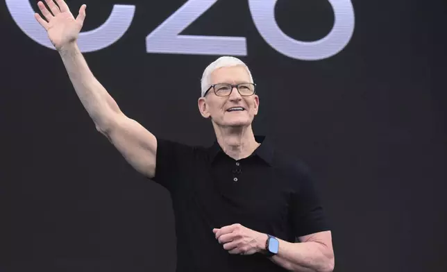 CEO Tim Cook waves during the annual World Wide Developers Conference at Apple's headquarters in Cupertino, Calif., Monday, June 8, 2026. (AP Photo/Noah Berger)
