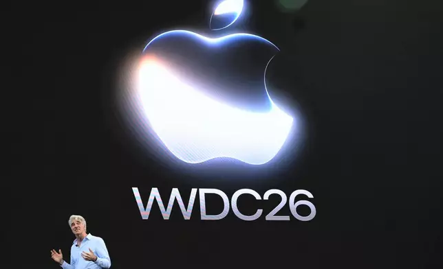 Craig Federighi, Apple's senior vice president of software engineering, speaks during the annual World Wide Developers Conference at Apple's headquarters in Cupertino, Calif., Monday, June 8, 2026. (AP Photo/Noah Berger)