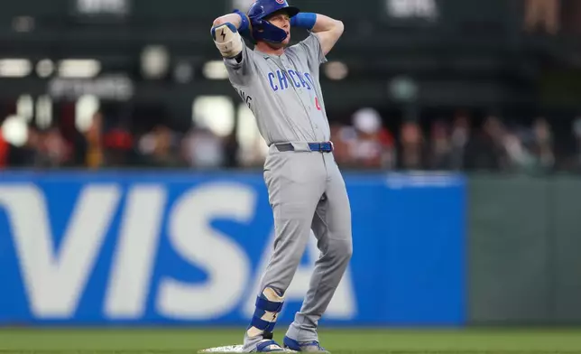 Chicago Cubs' Pete Crow-Armstrong reacts after hitting a double during the third inning of a baseball game against the San Francisco Giants Friday, June 12, 2026, in San Francisco, Calif. (AP Photo/Scott Marshall)