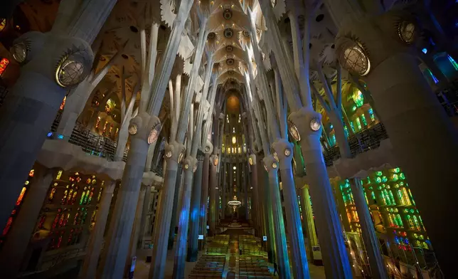 The interior of Antoni Gaudí's iconic Basilica of the Sagrada Familia in Barcelona, Spain, Wednesday, May 20, 2026, ahead of Pope Leo XIV's visit to the city in June. (AP Photo/Emilio Morenatti)
