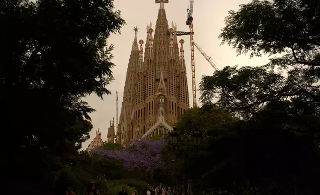 Antoni Gaudí's Basilica of the Sagrada Familia stands in Barcelona, Spain, Sunday, May 31, 2026, as the landmark church prepares for Pope Leo XIV's visit to the city in June. (AP Photo/Emilio Morenatti)