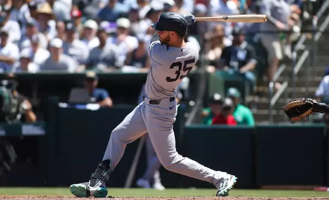 New York Yankees' Cody Bellinger hits an RBI single during the third inning of a baseball game against the Athletics, Sunday, May 31, 2026, in West Sacramento, Calif. (AP Photo/Scott Marshall)