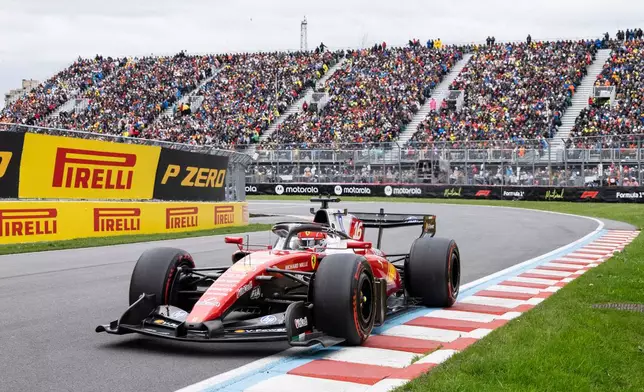 Ferrari driver Charles Leclerc, of Monaco, drives during the F1 Canadian Grand Prix auto race in Montreal, Sunday, May 24, 2026. (Christinne Muschi/The Canadian Press via AP)