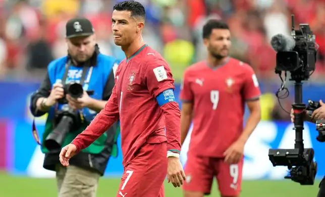 Portugal's Cristiano Ronaldo leaves the pitch after the World Cup Group K soccer match between Portugal and Congo in Houston, Wednesday, June 17, 2026. (AP Photo/Karen Warren)