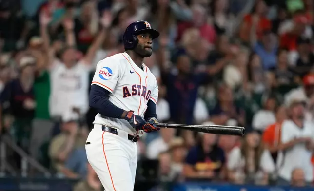 Houston Astros designated hitter Yordan Alvarez watches his grand slam against the Athletics during the second inning of a baseball game, Saturday, June 6, 2026, in Houston. (AP Photo/Eric Christian Smith)