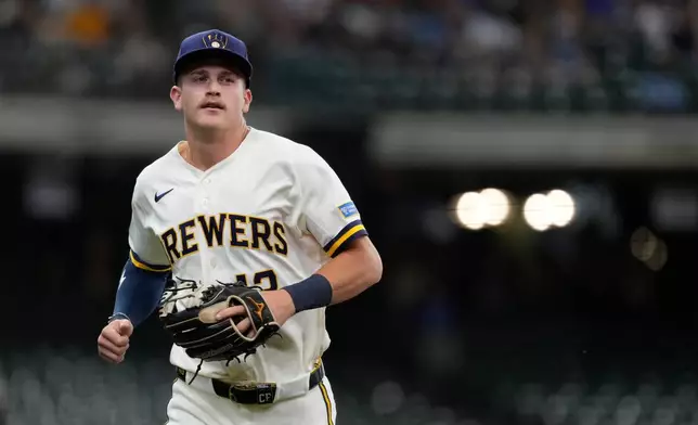 Milwaukee Brewers' Cooper Pratt jogs to the dugout during the first inning of a baseball game against the Cleveland Guardians, Tuesday, June 16, 2026, in Milwaukee. (AP Photo/Aaron Gash)