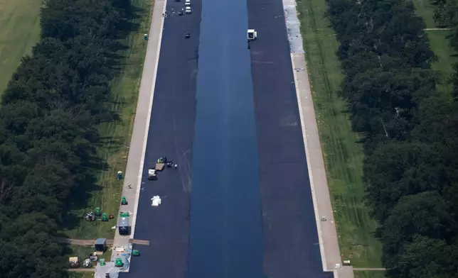 The Lincoln Memorial Reflecting Pool begins to refill with water, Friday, June 5, 2026, in Washington. (AP Photo/Allison Robbert)