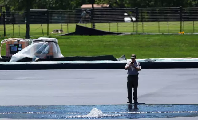Work continues on the Lincoln Memorial Reflecting Pool, Thursday, June 4, 2026, in Washington. (AP Photo/Stephanie Scarbrough)