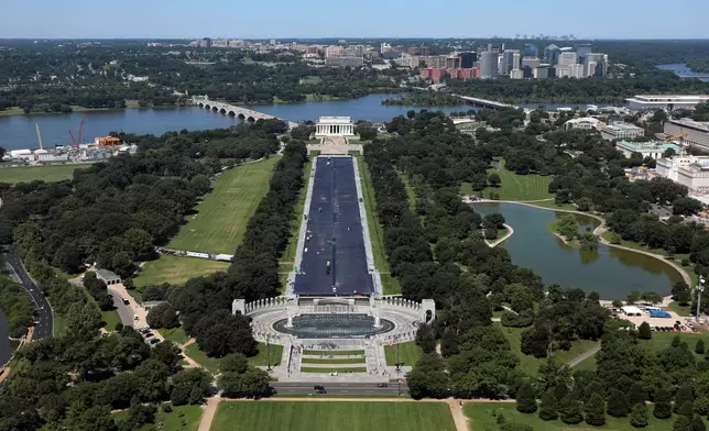 The renovation project to apply a blue protective coating to the Lincoln Memorial Reflecting Pool, Wednesday, June 3 2026, in Washington, as seen from the Washington Monument. (AP Photo/Rahmat Gul)