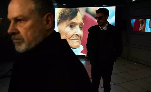 FILE - An image of Taty Almeida, one of the founders of the Mothers of Plaza de Mayo human rights group, is displayed on a screen during her wake in Buenos Aires, Argentina, June 15, 2026. (AP Photo/Rodrigo Abd, File)