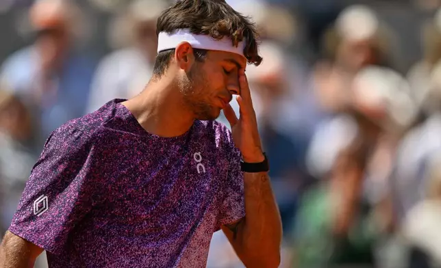 Italy's Flavio Cobolli reacts during the final tennis match against Germany's Alexander Zverev at the French Open in Paris, Sunday, June 7, 2026. (AP Photo/Emma Da Silva)