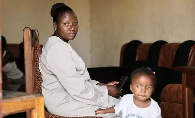 Esperance Masinda, an Ebola survivor, poses for a photo at her home in Beni, Congo, Tuesday, June 2, 2026. (AP Photo/Kitsa Musayi Sebastien)
