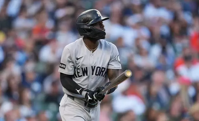 New York Yankees' Jazz Chisholm Jr. watches his two-run home run against the Detroit Tigers during the sixth inning of a baseball game Tuesday, June 23, 2026, in Detroit. (AP Photo/Paul Sancya)