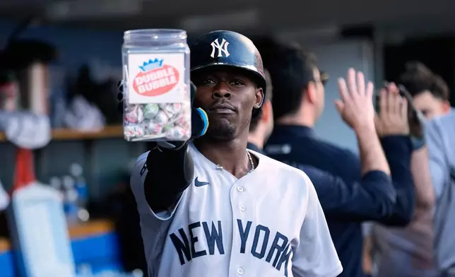 New York Yankees' Jazz Chisholm Jr. celebrates his two-run home run against the Detroit Tigers during the sixth inning of a baseball game Tuesday, June 23, 2026, in Detroit. (AP Photo/Paul Sancya)