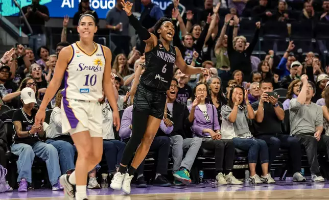 Golden State Valkyries' Kaila Charles (6) celebrates after a 3-point basket against the Los Angeles Sparks in the first half of a WNBA basketball game Monday, June 15, 2026, in San Francisco. (Carlos Avila Gonzalez/San Francisco Chronicle via AP)