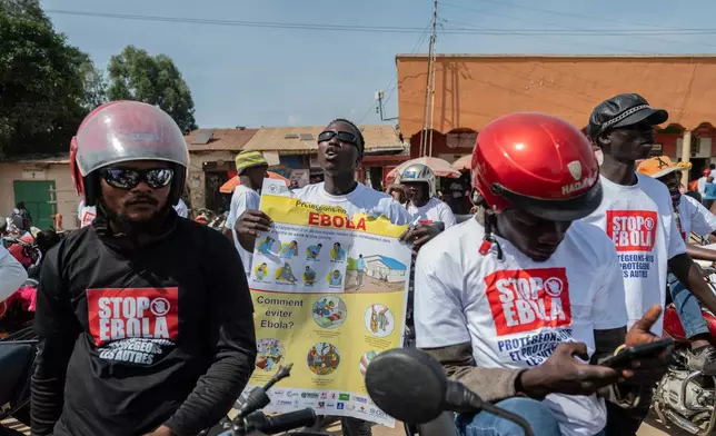 Motorcyclists join an awareness campaign organized by the World Health Organization (WHO) to combat Ebola in Bunia, Congo, Wednesday, June 10, 2026. (AP Photo/Moses Sawasawa)